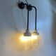 Pair of Art Deco wall lights in cast iron, glass and ceramic from the 1930s.
