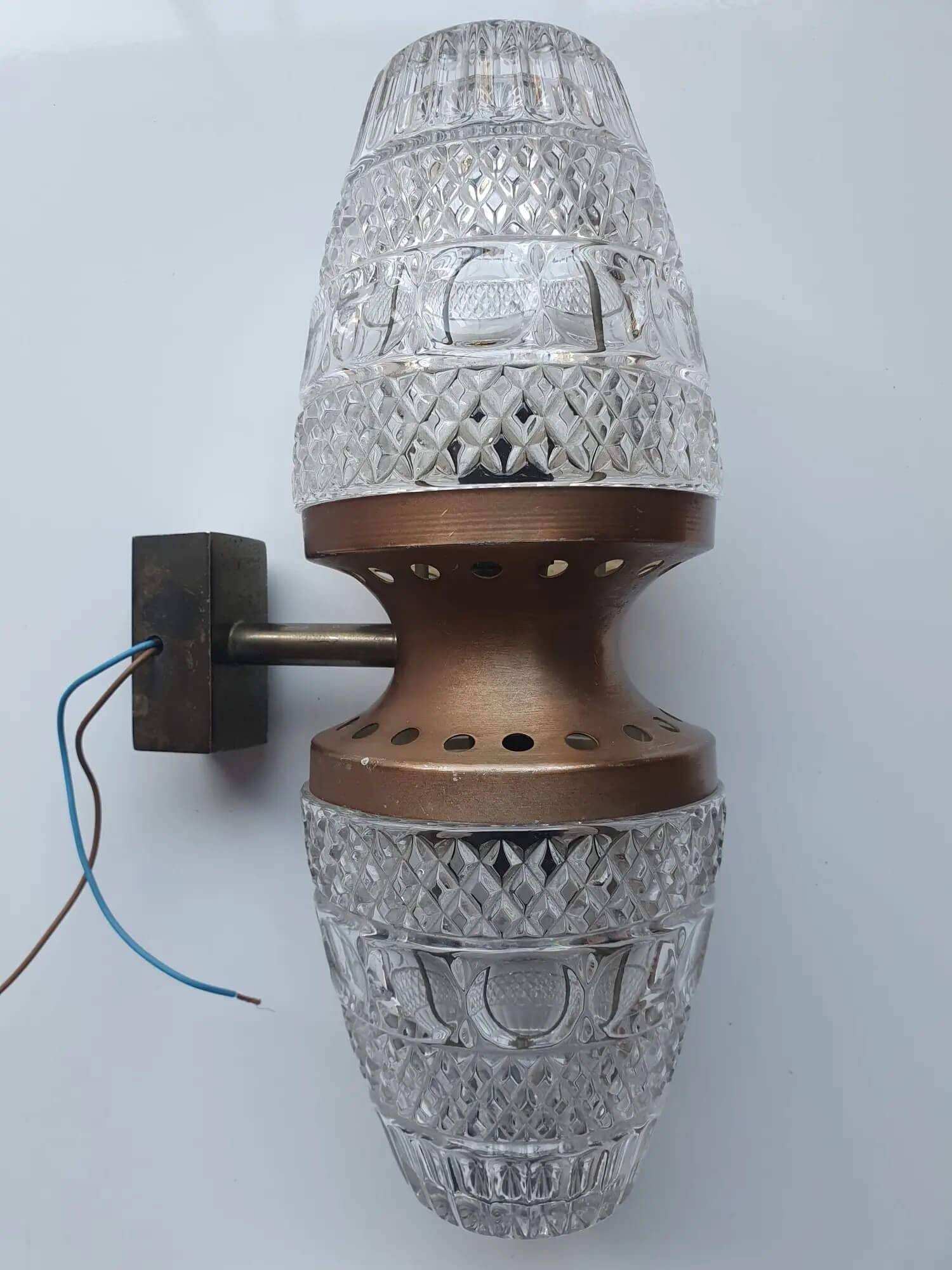 Vintage brass wall sconce with two glass globes