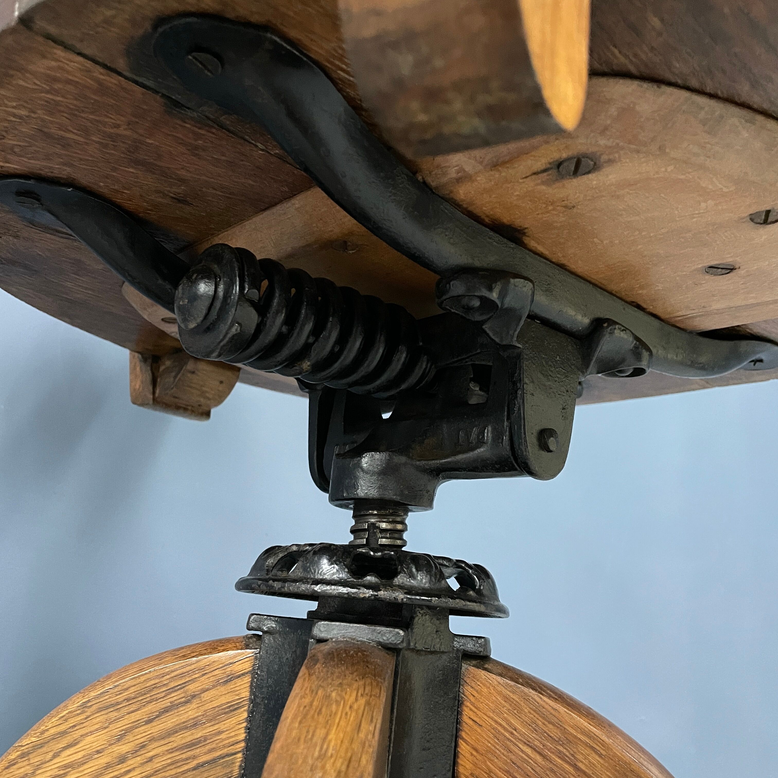 Antique American oak office chair with armrests 1920s