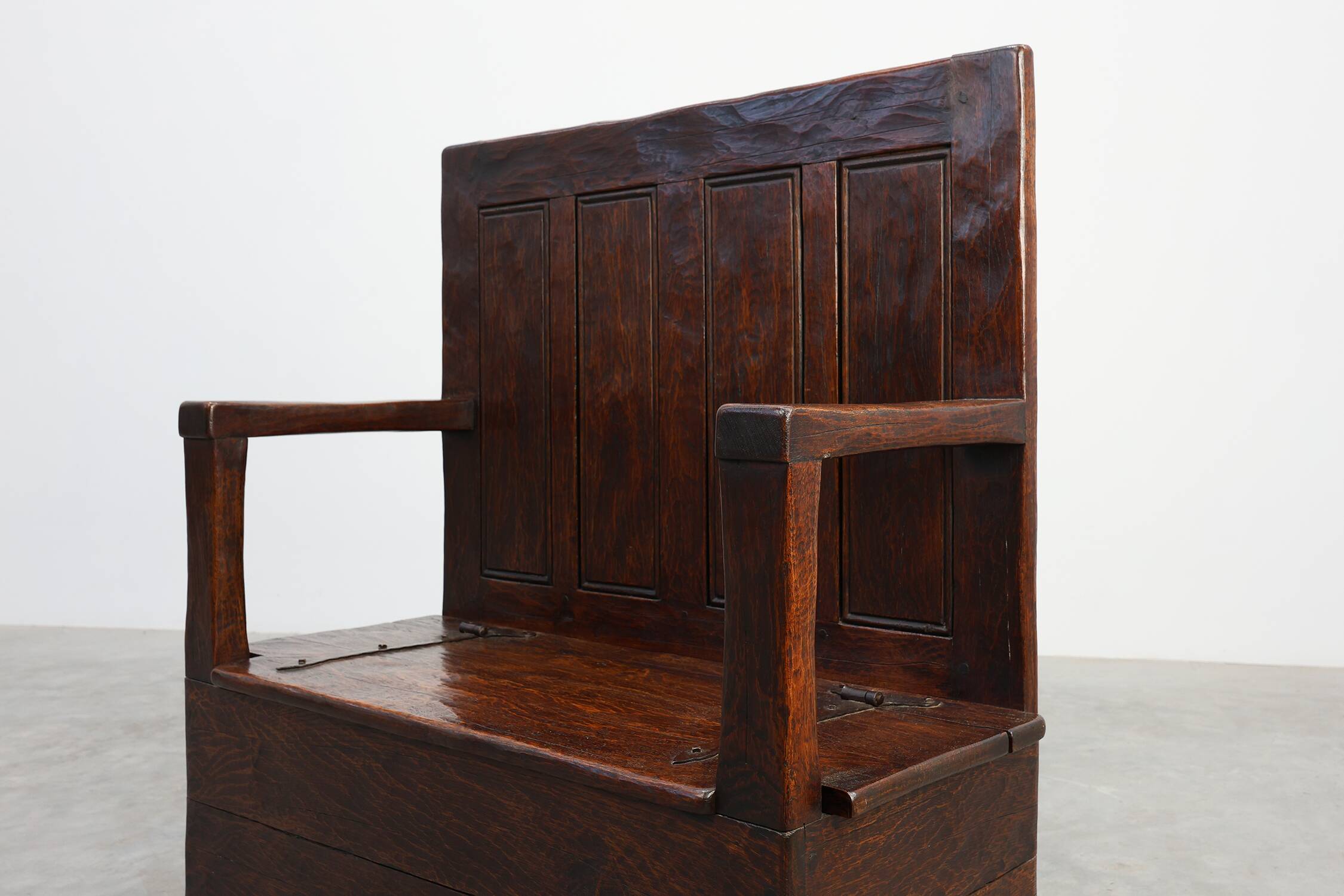Rustic solid oak carved bench with storage compartment, France 19th century