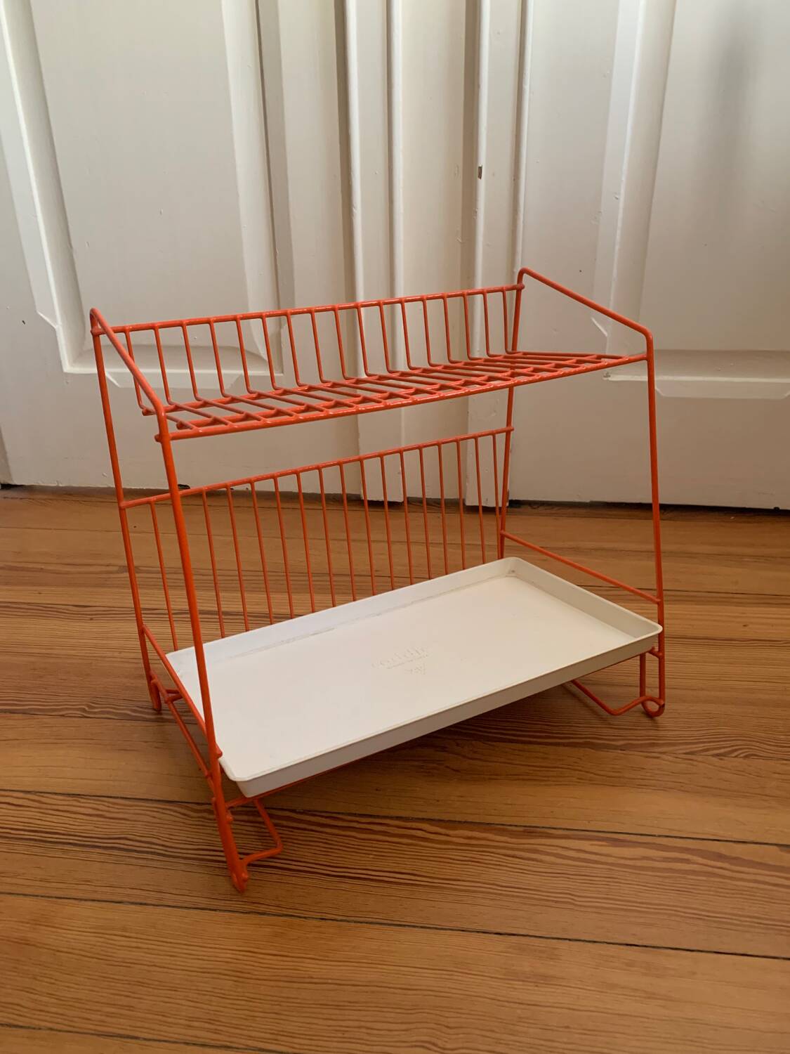 Authentic orange vintage metal drainer shelf from the Caddy brand