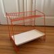 Authentic orange vintage metal drainer shelf from the Caddy brand