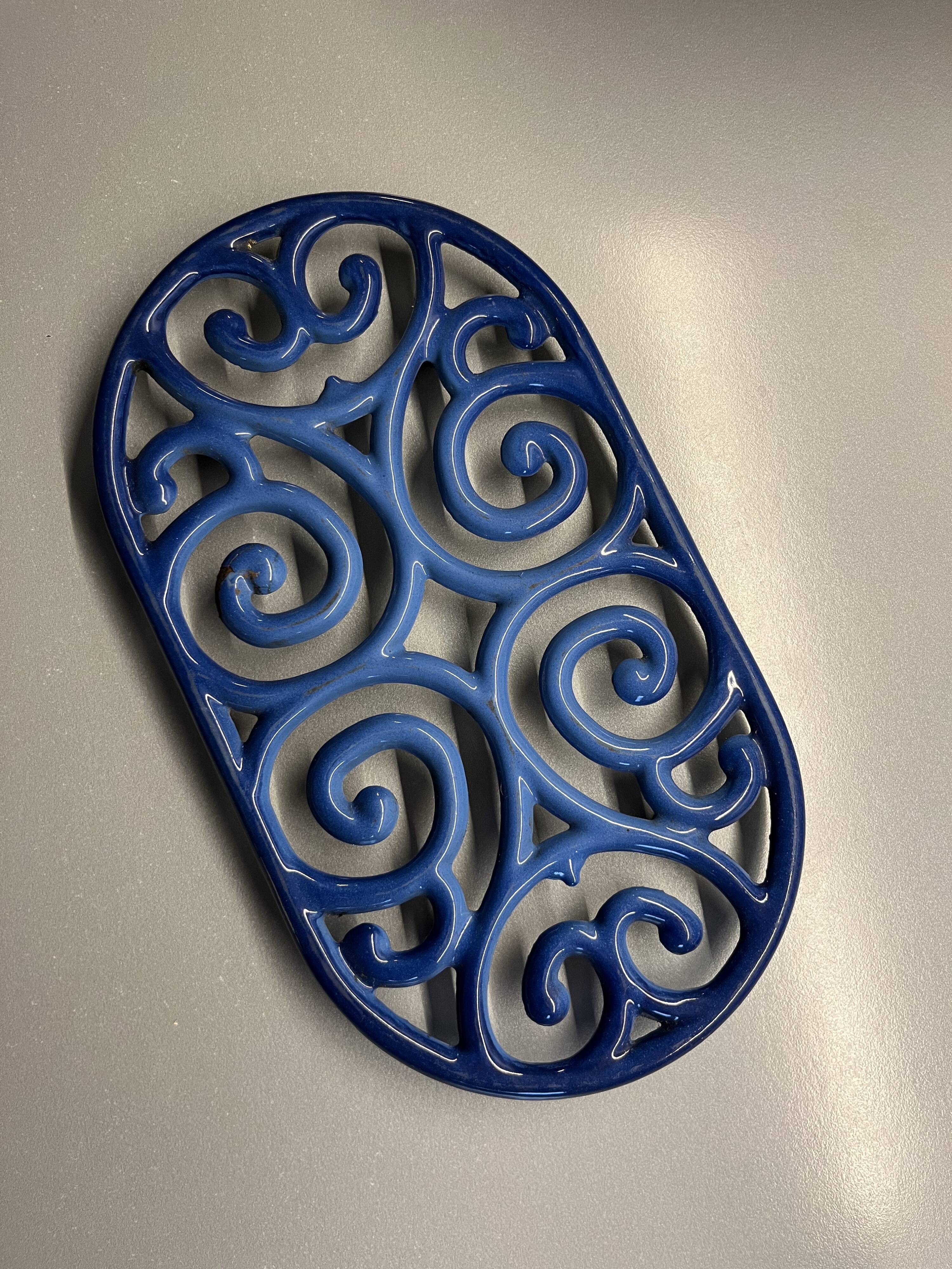 Old cast iron table mat