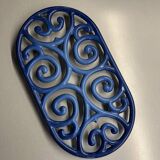 Old cast iron table mat