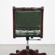 English Chesterfield office chair in green leather, height adjustable on casters