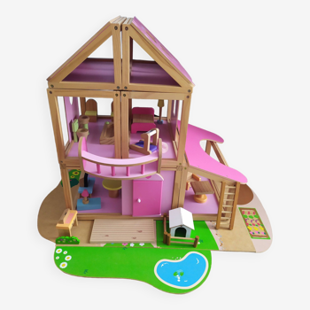 Farm-themed wooden dollhouse
