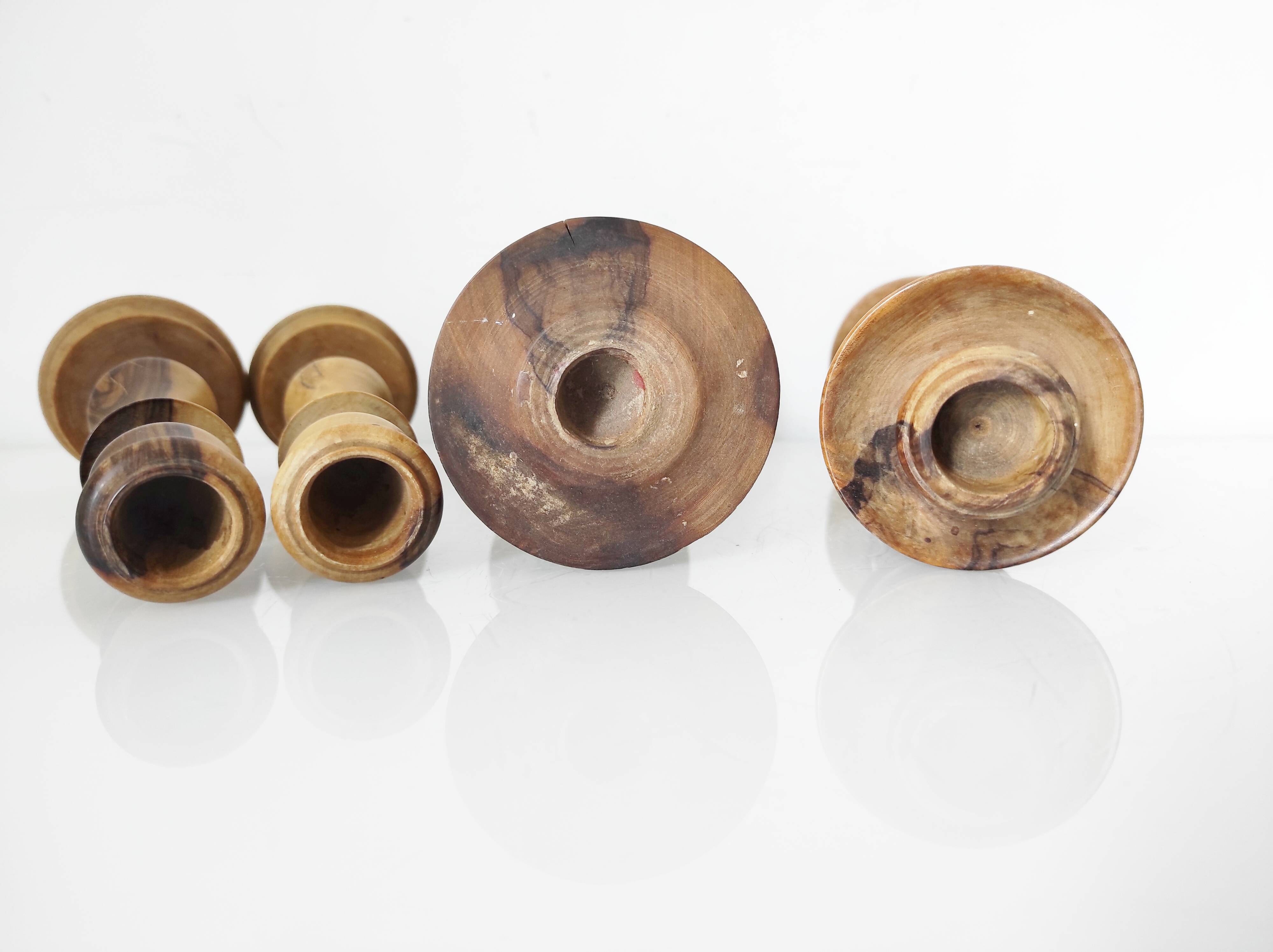 Set of 4 turned wooden candle holders
