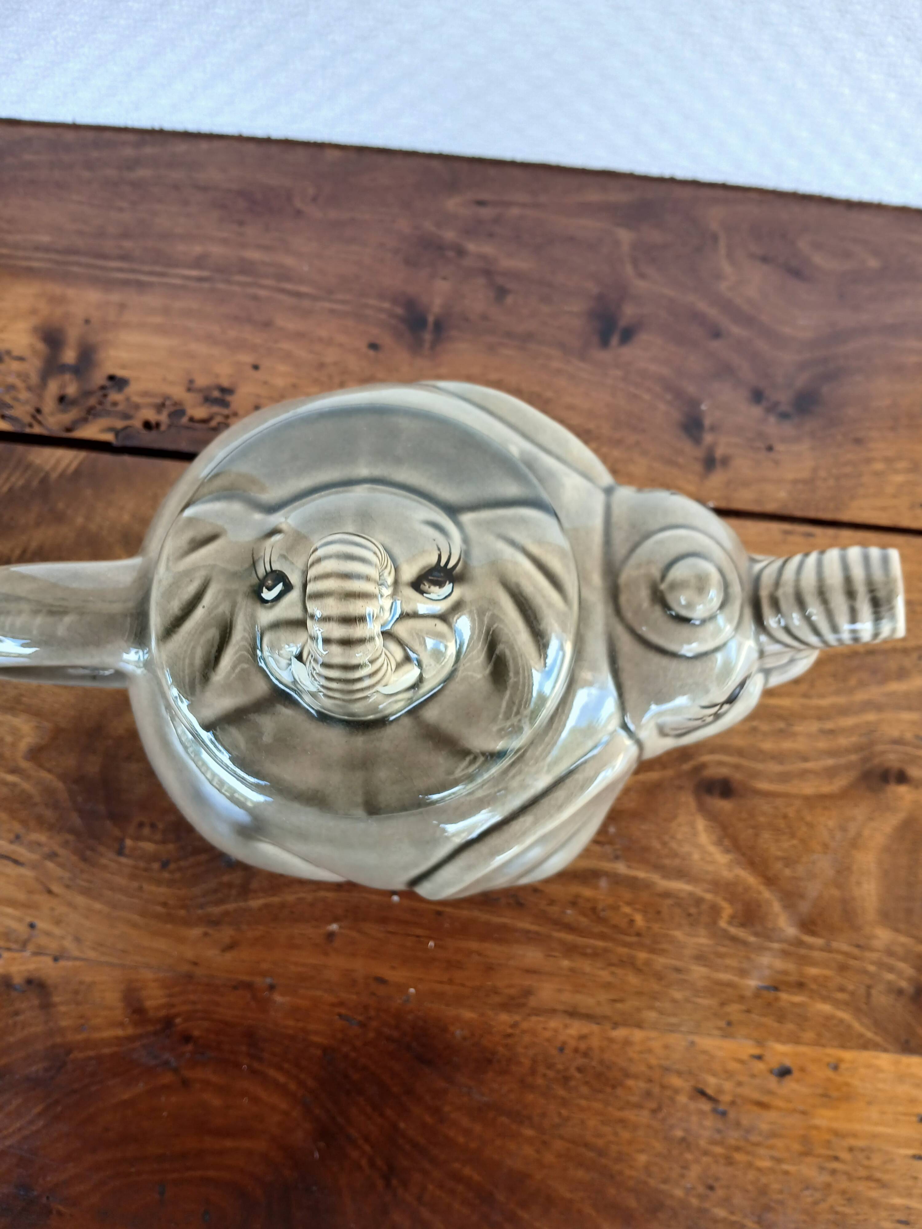 vintage ceramic teapot in the shape of a grey elephant