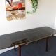 Folding table with black and gold painted glass, 1950