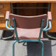 School teacher's chair in imitation leather and tubular metal