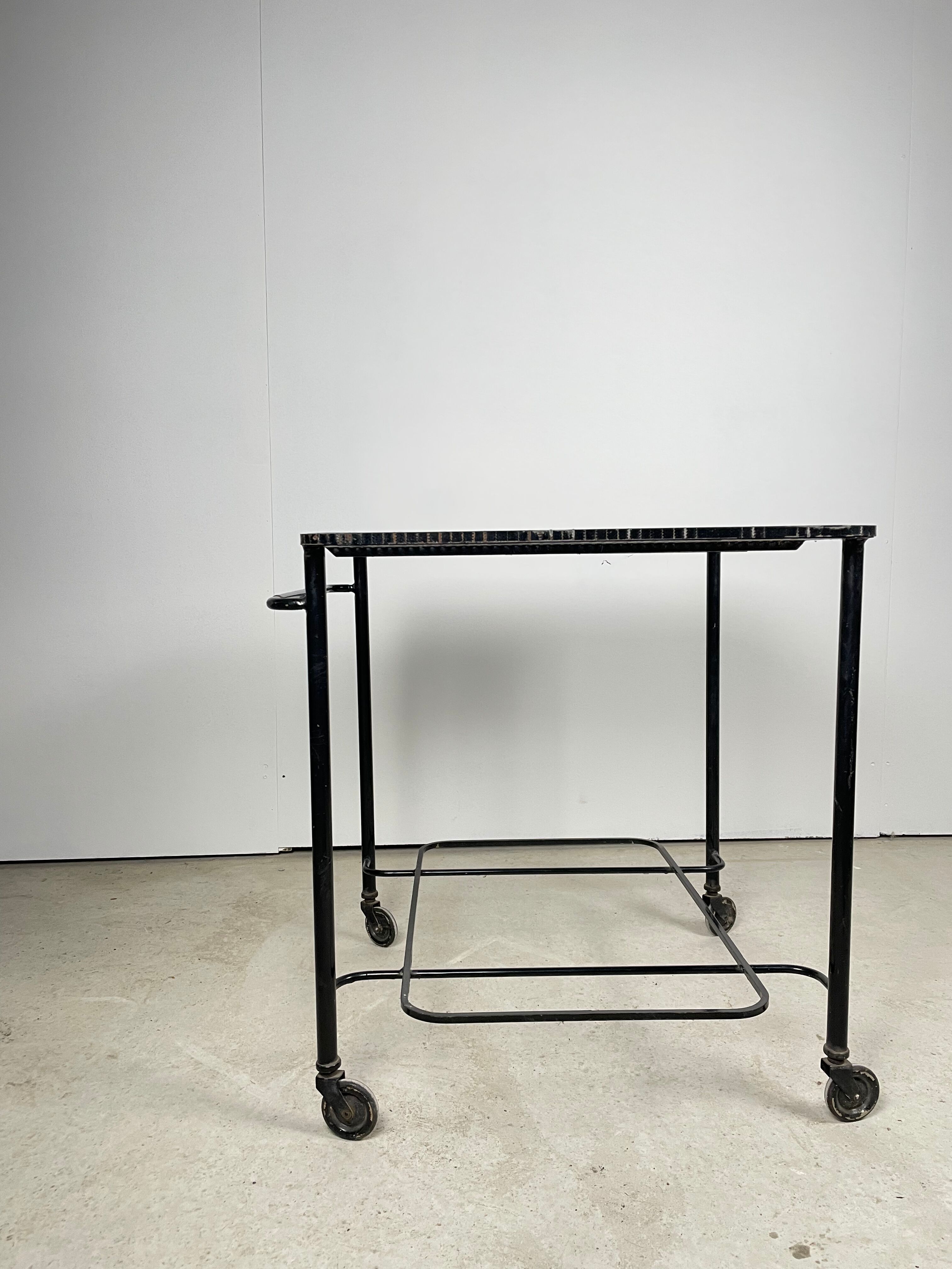 Trolley in perforated sheet metal