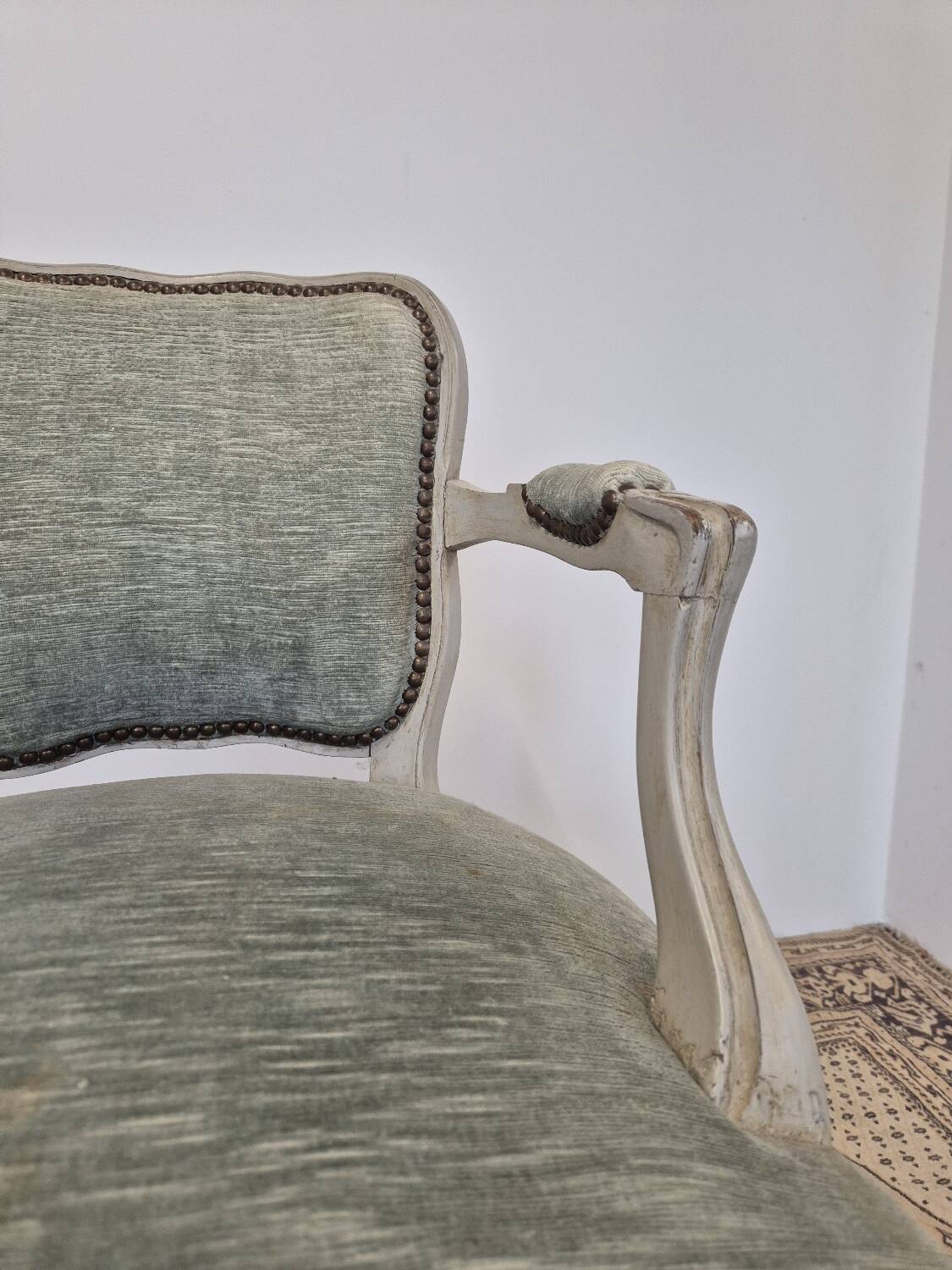 Louis XV style cabriolet armchair in patinated wood and velvet