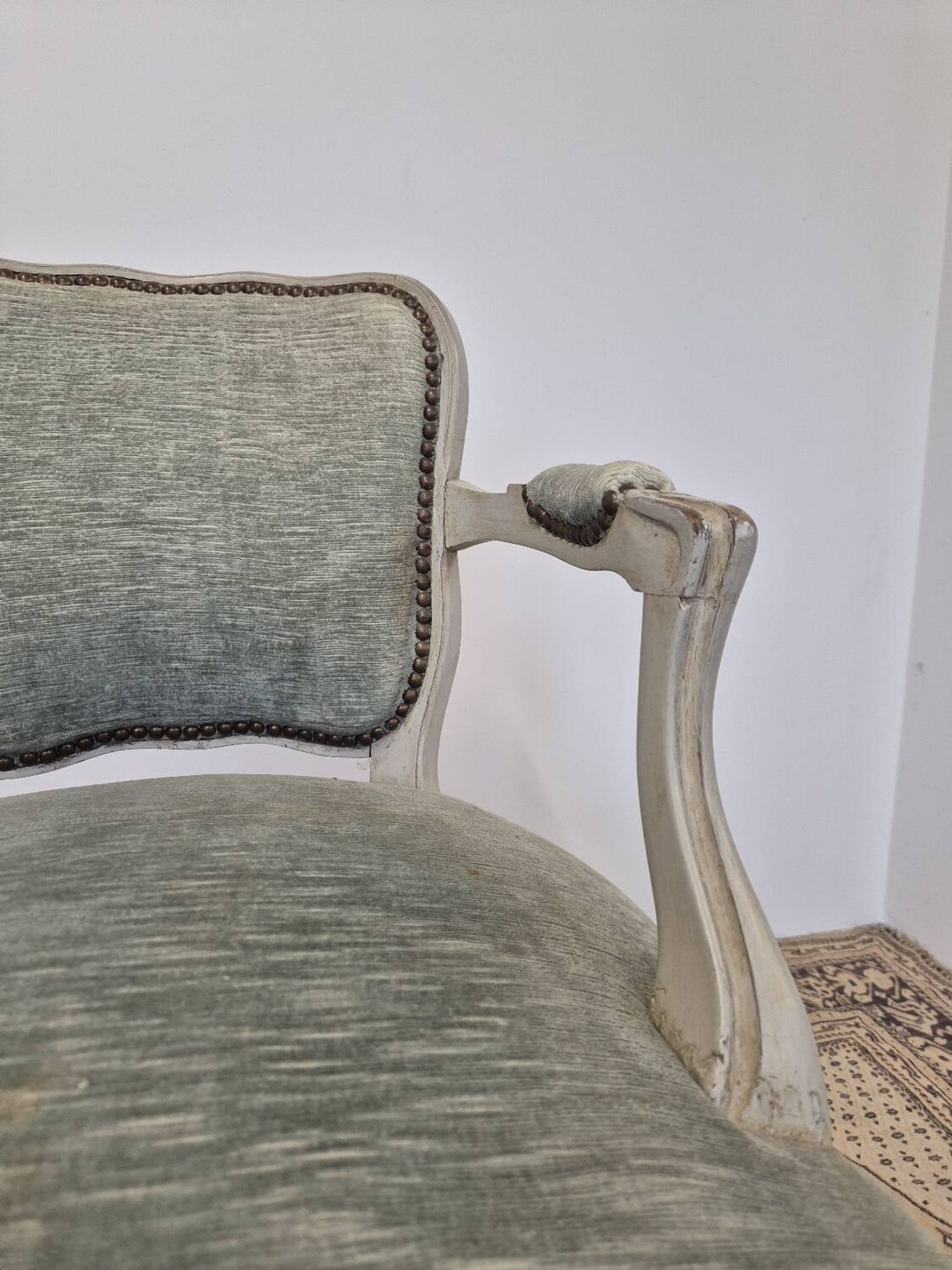 Louis XV style cabriolet armchair in patinated wood and velvet