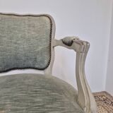 Louis XV style cabriolet armchair in patinated wood and velvet