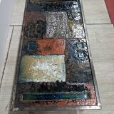 Coffee table in enamelled lava stone