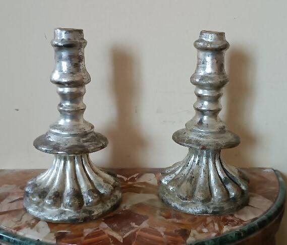 Rare pair of antique silvered terracotta candlesticks from the 17th century.