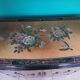 Buffet of black and gold laqué Chinese storage with relief subjects decorated flowers painted birds