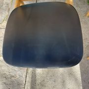 3 Scandinavian style chairs, light wood and black faux leather.