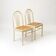 Set of 2 postmodern dining chairs in white painted wood and cane, 1980s