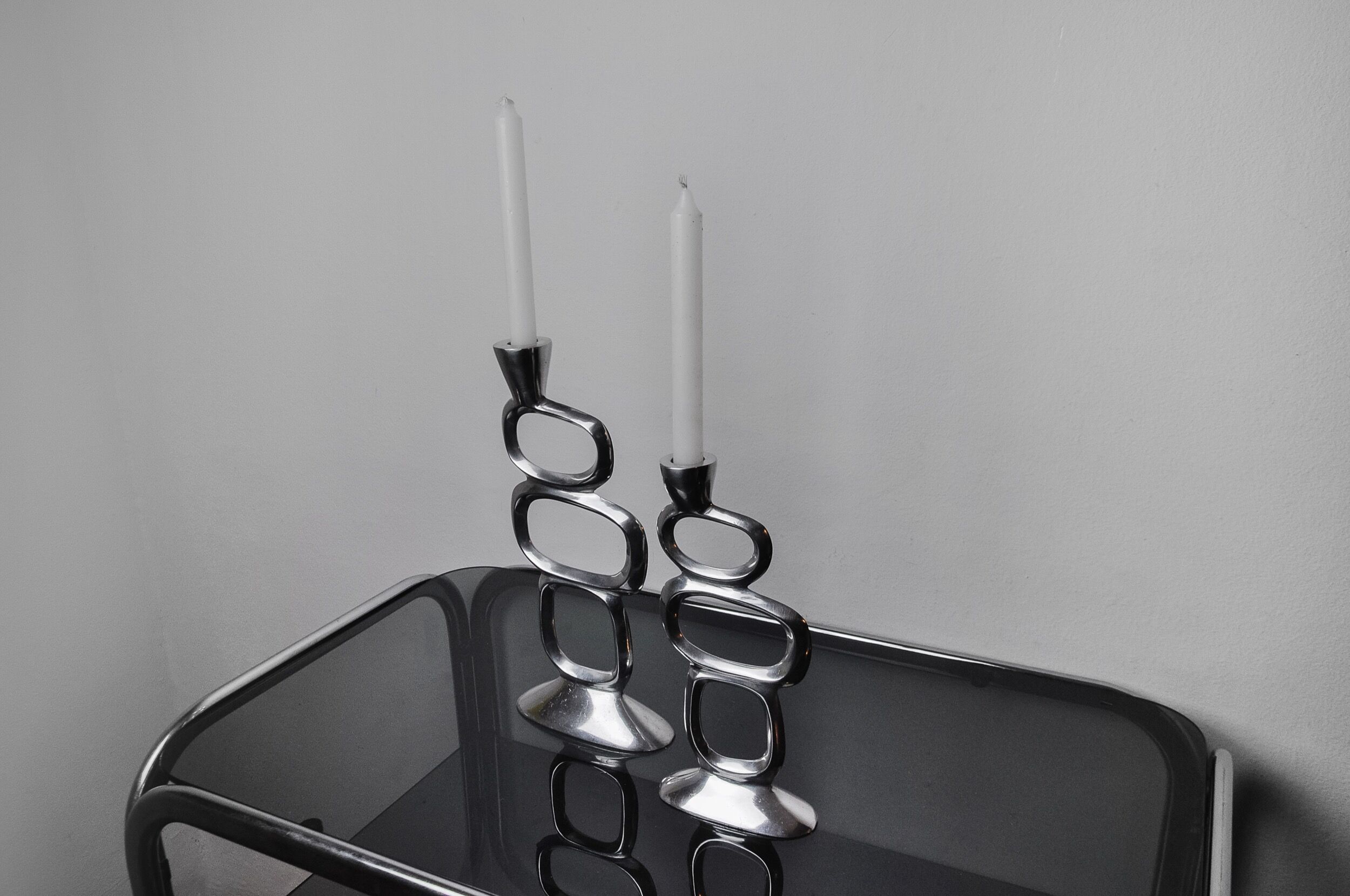 Pair of circle candlesticks by Matthew Hilton, England, 1980