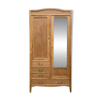 Parisian hotel wardrobe with bevelled mirror, solid raw oak, 1920.