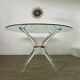 Venice model round dining table from Madelia by Paris Altuglas foot