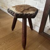 Brutalist wooden and cowhide stool