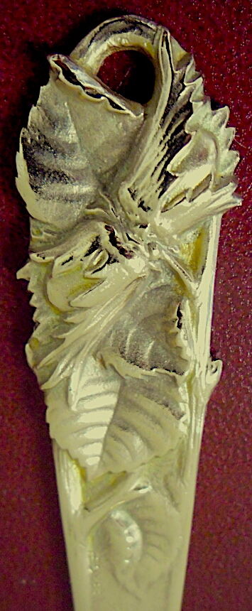 Bronze paper cutter decorated with trendy hazelnuts