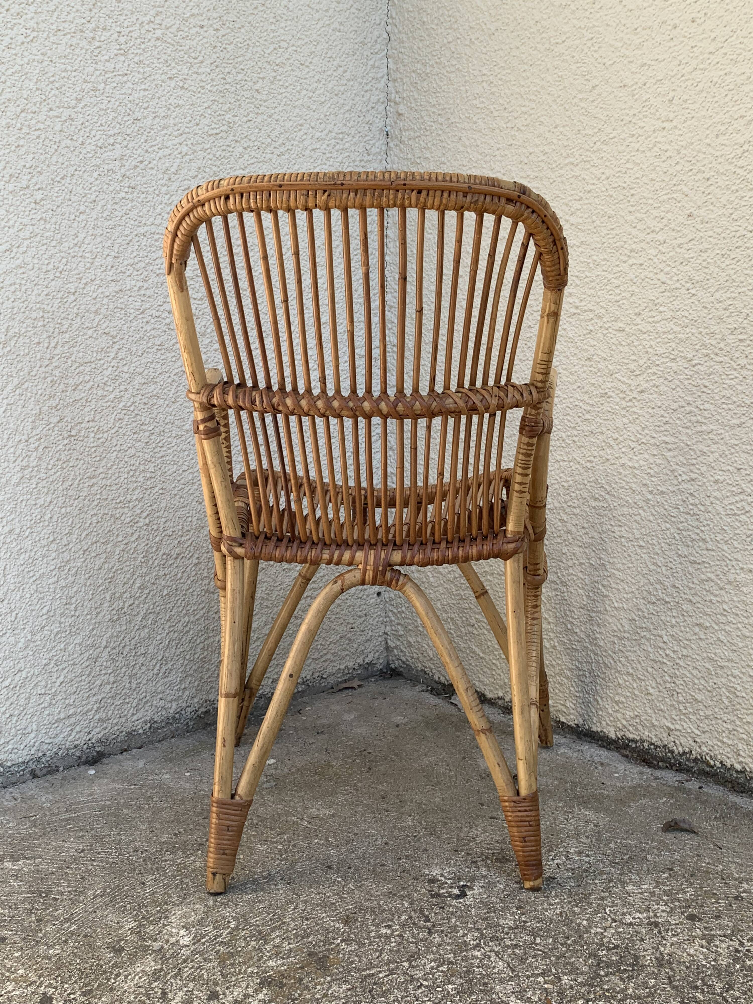 Chair and armchair in vintage rattan 1950