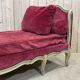 Louis XV style daybed in painted wood and covered with a red velvet
