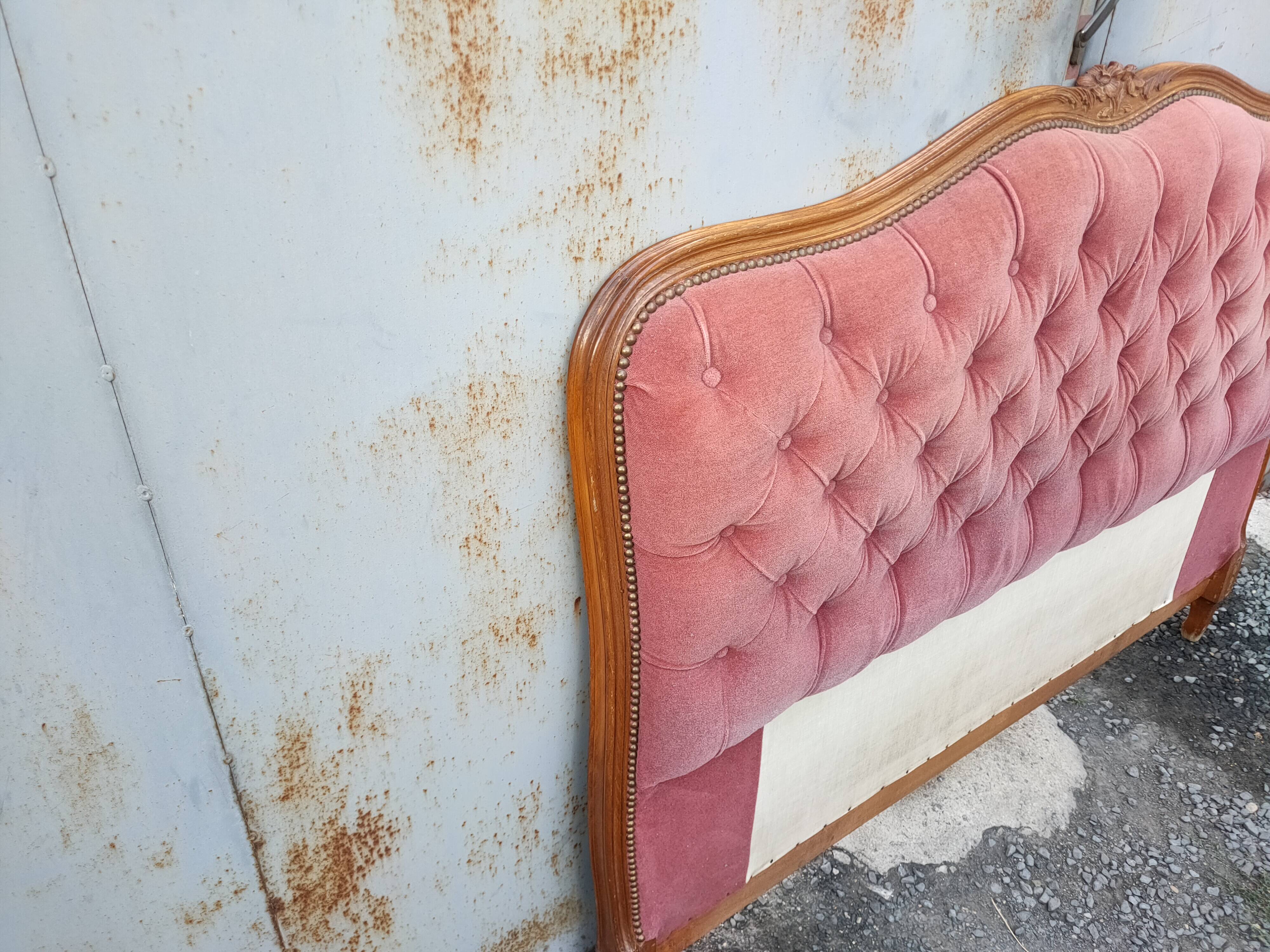 antique wooden and fabric headboard