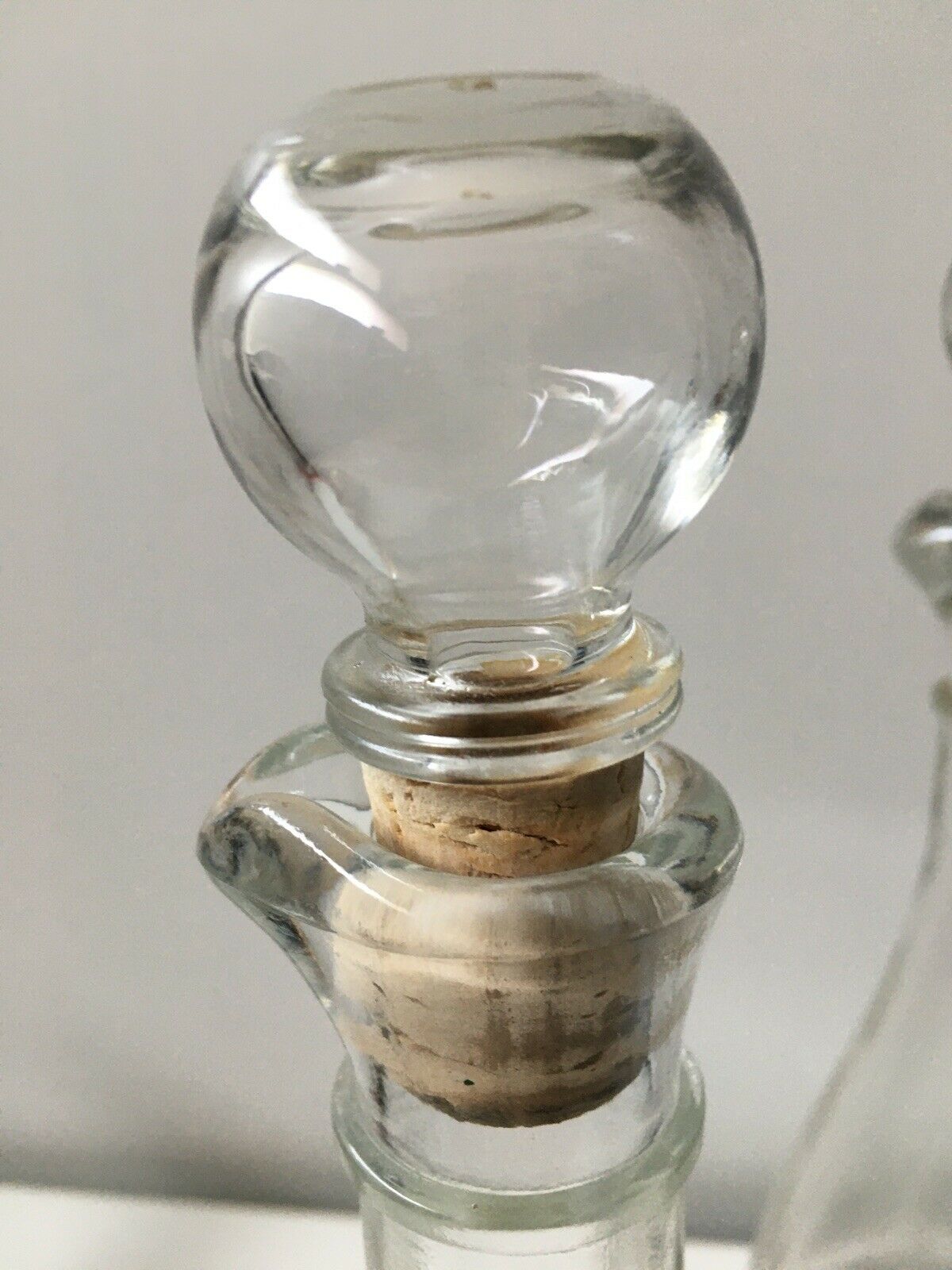 Lot of 2 old glass and tin condiment service bottles and corks