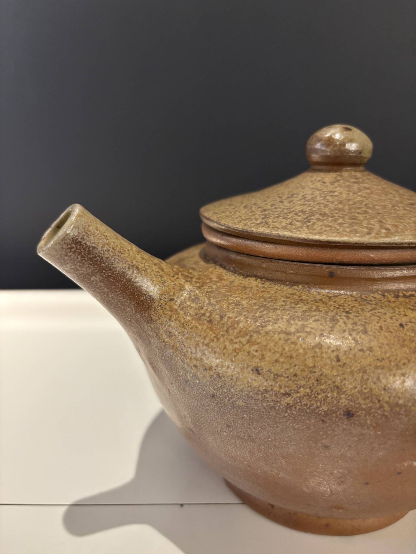 Brown glazed stoneware teapot