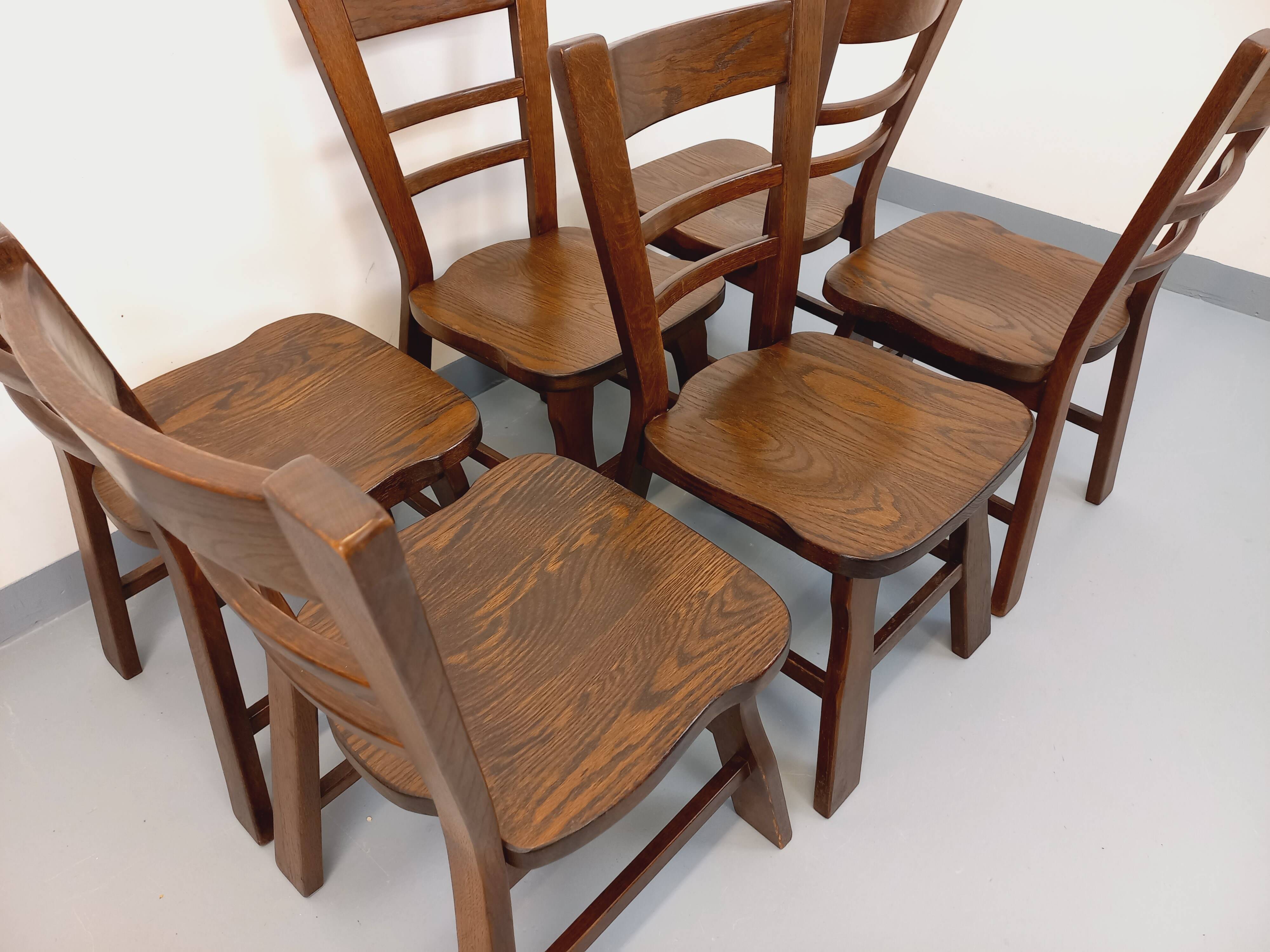 Set of 6 vintage brutalist oak chairs from the 1950s.