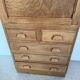 Vintage wooden secretary desk in the style of a professional piece of furniture