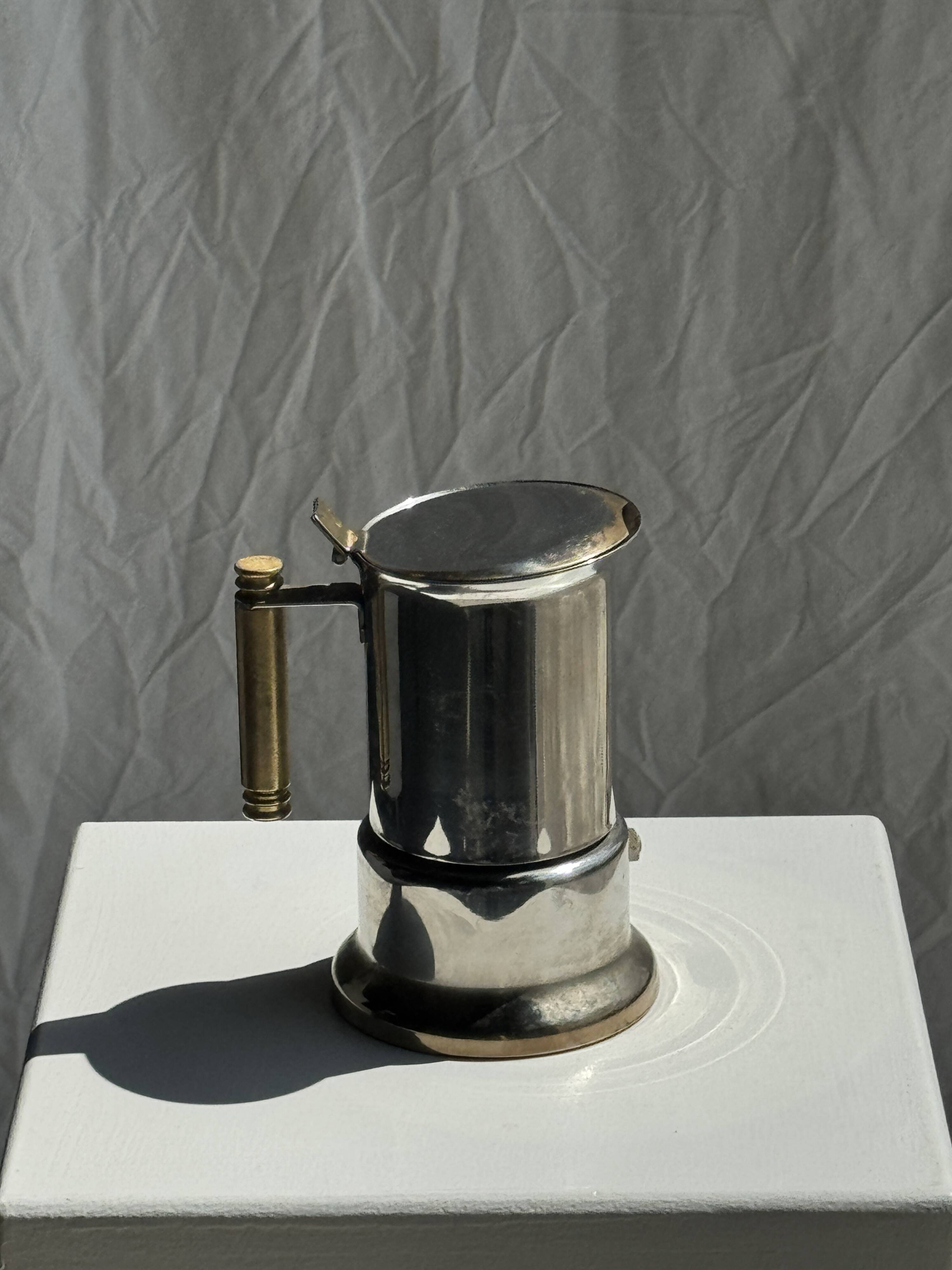Small silver and gold Italian coffee maker Alpu-F Puppieni in stainless steel