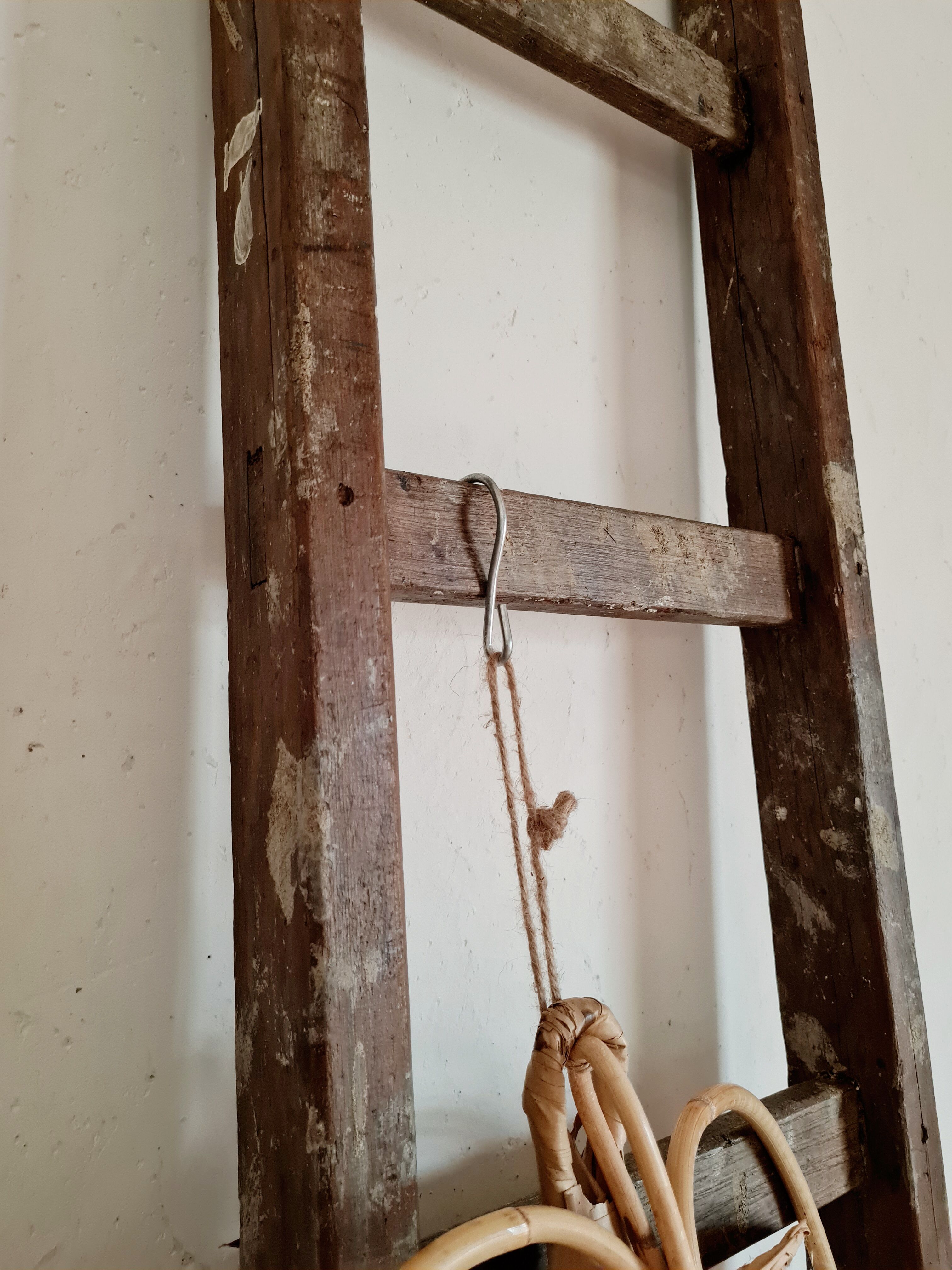 Old wooden scale right and painting presence