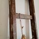 Old wooden scale right and painting presence