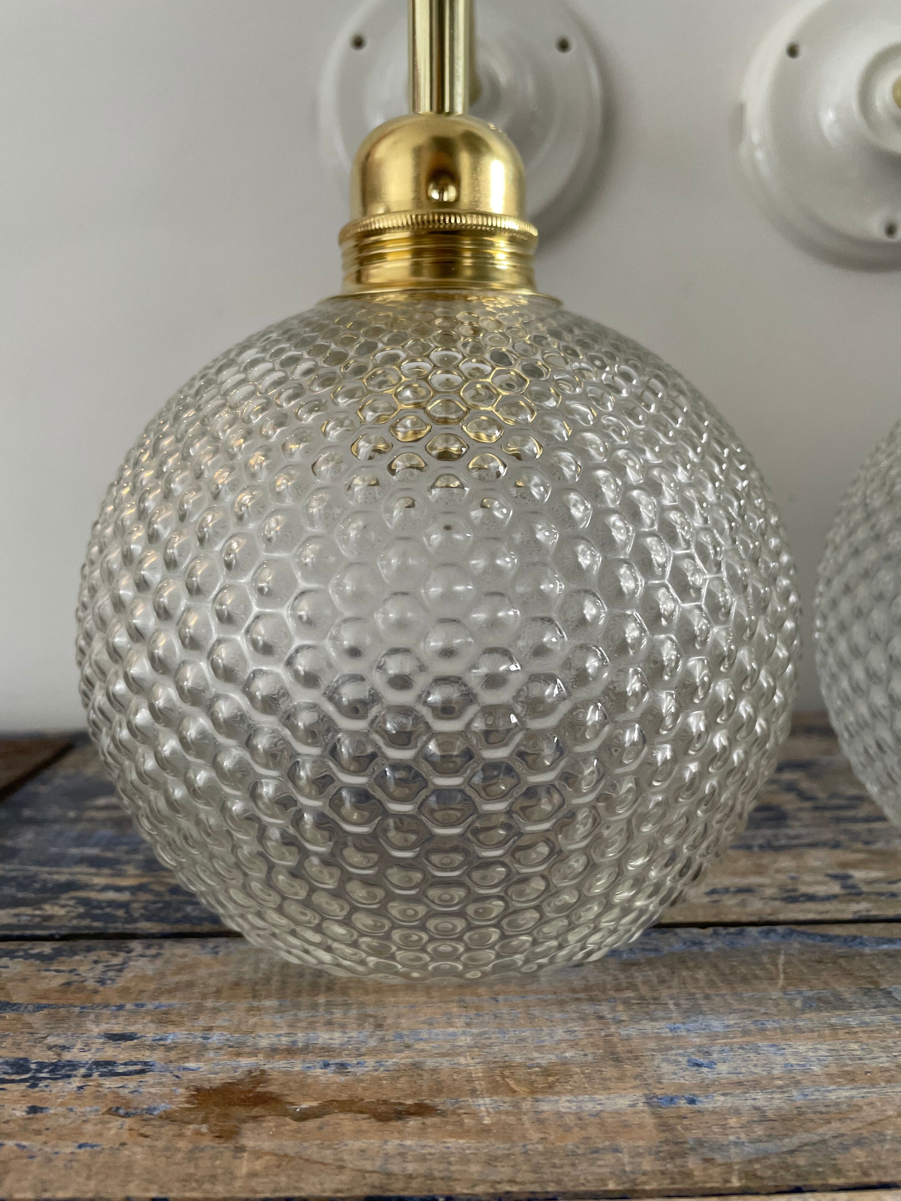 Pair of wall sconces glass globes