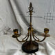 Pair of Empire style candlesticks, patinated brass and black stone.
