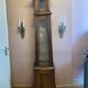 Walnut showcase, grooved uprights, 4 glass shelves