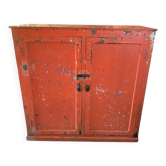 Old wooden workshop furniture with beautiful red patina