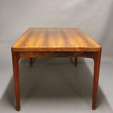 Teak dining table designed by Henning Kjaernulf and manufactured 60 years