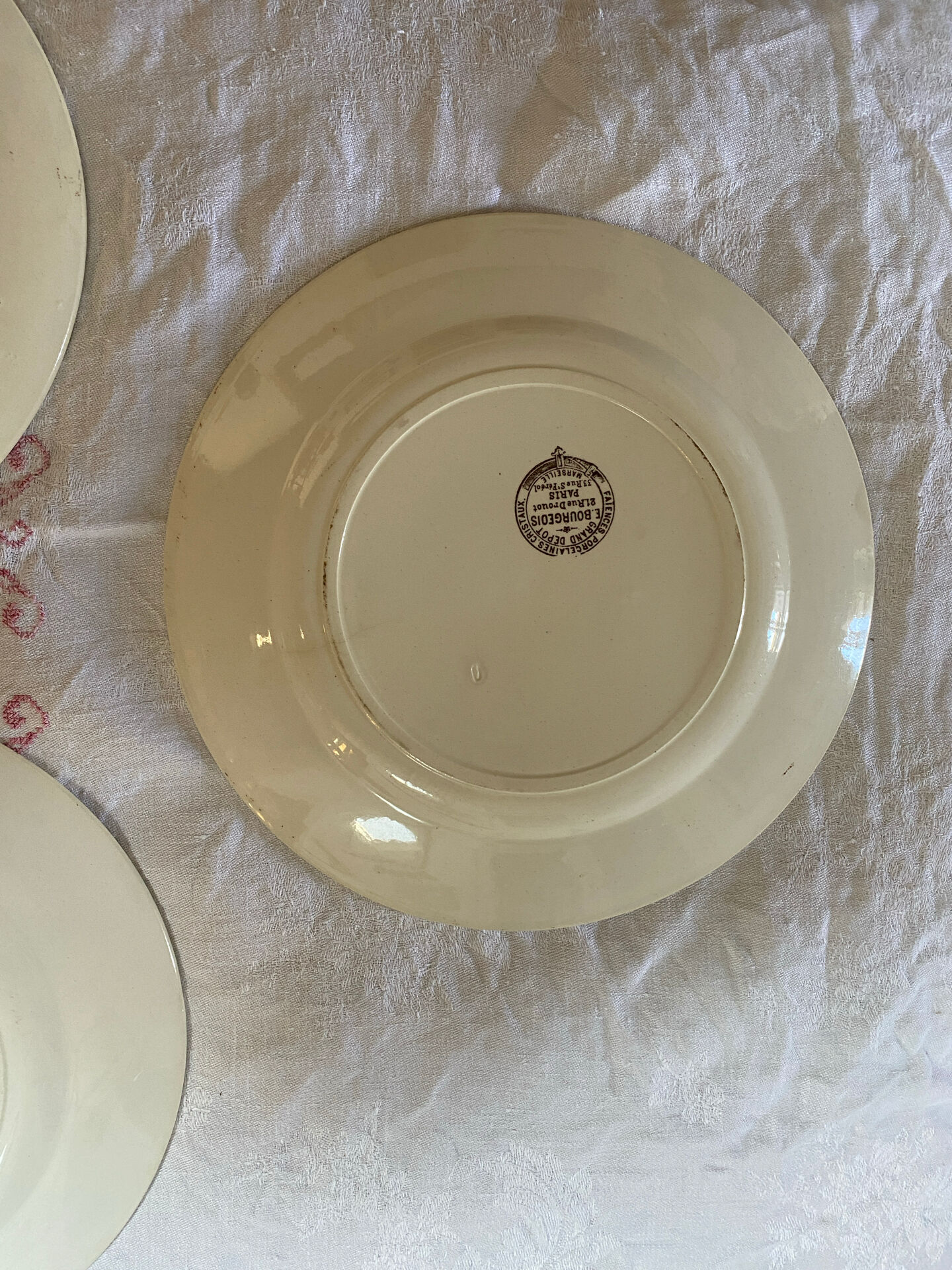Set of 3 flat plates in polychrome ironstone E. Bourgeois