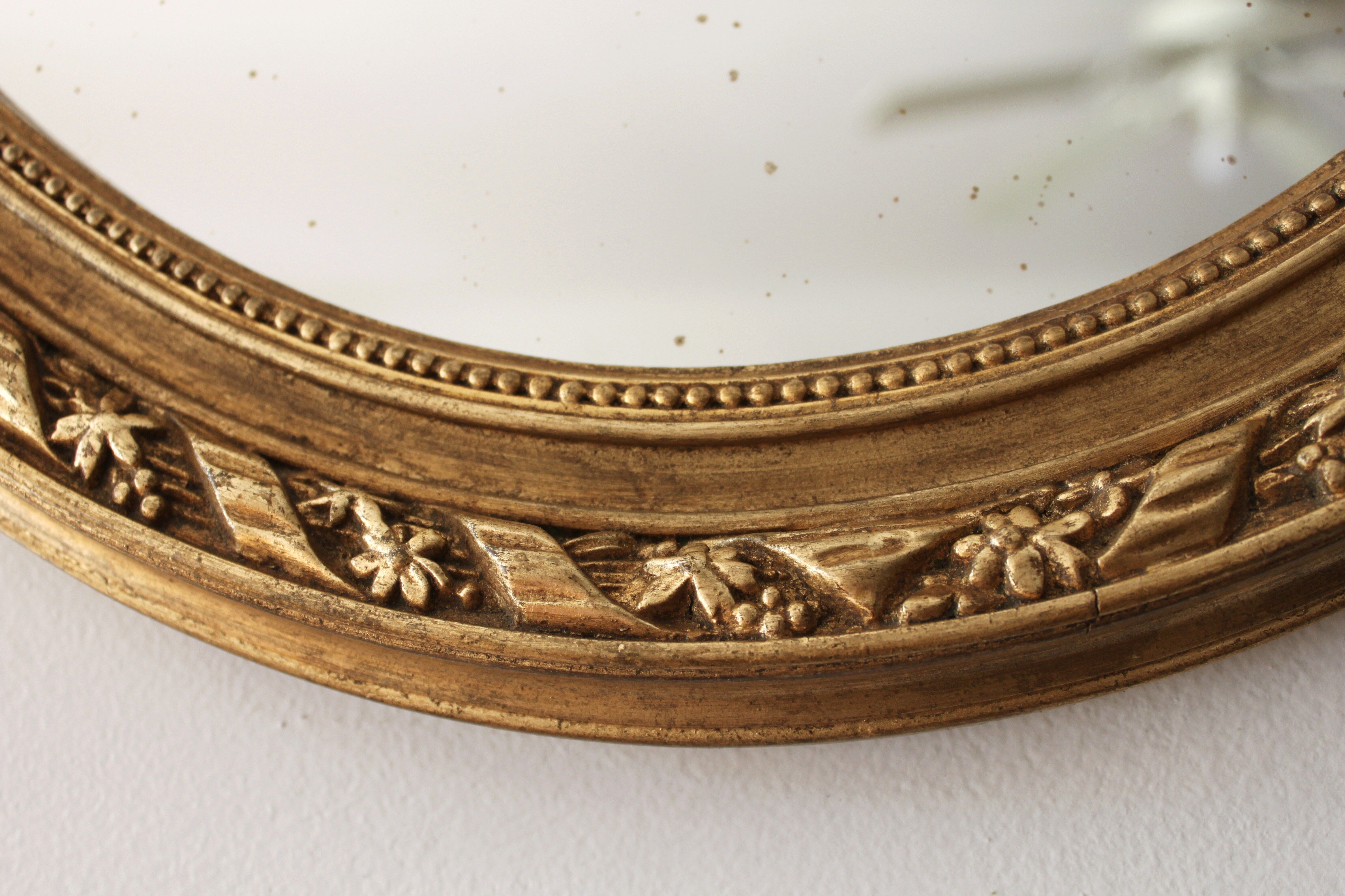 Mirror oval, golden Louis XVI style