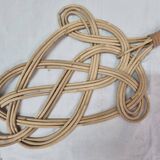 Tapette à tapis, tape tapis en rotin tressé