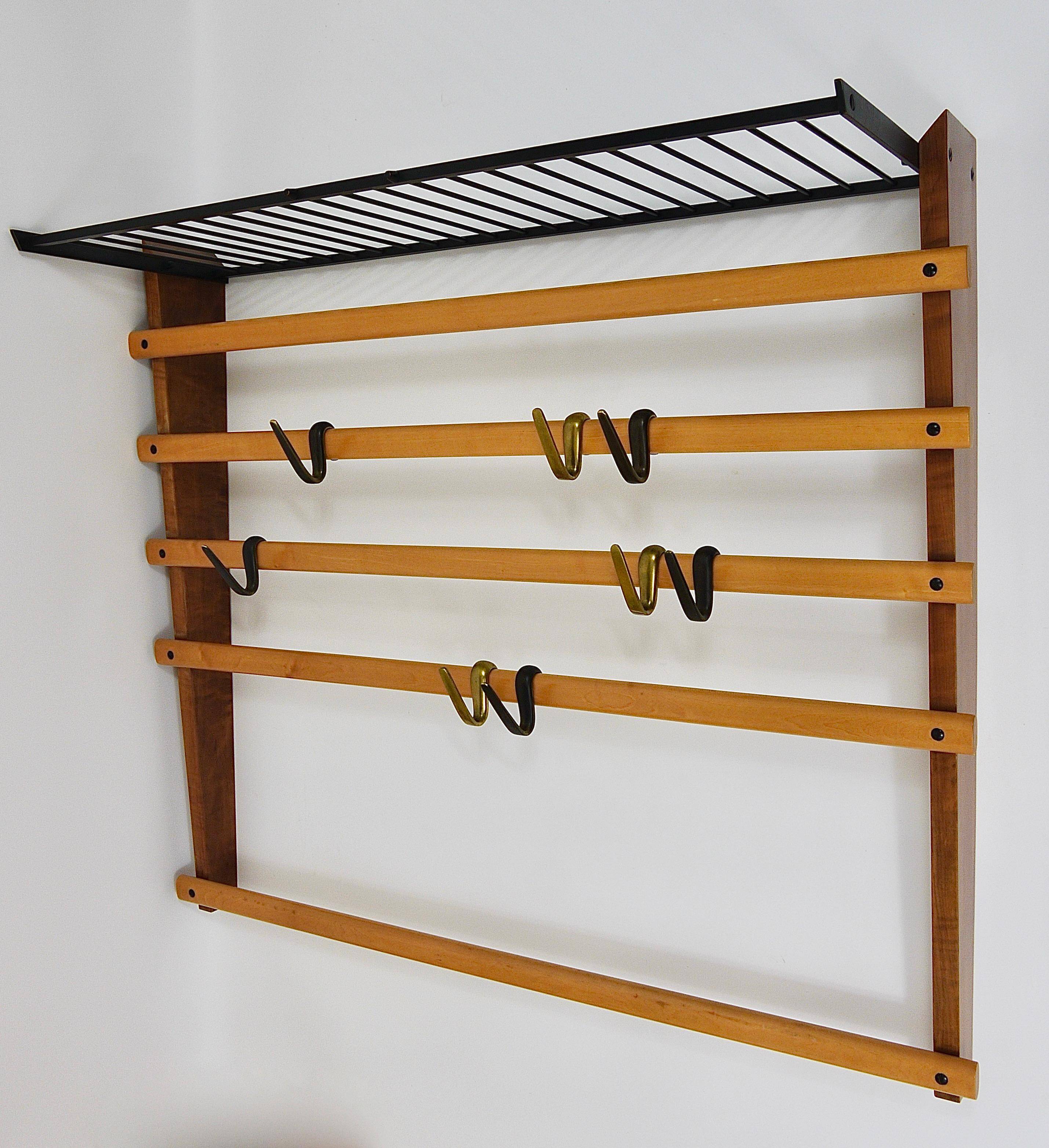 Rare coat rack by Carl Auböck with hat rack, cabinet, brass, walnut and beech, 1950s.