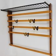 Rare coat rack by Carl Auböck with hat rack, cabinet, brass, walnut and beech, 1950s.