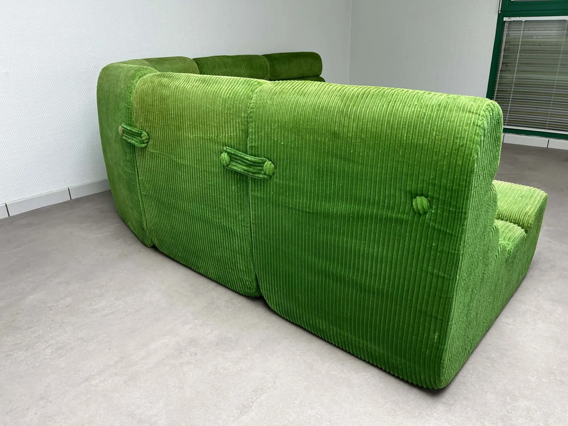 Modular green velvet corner sofa, 1970s
