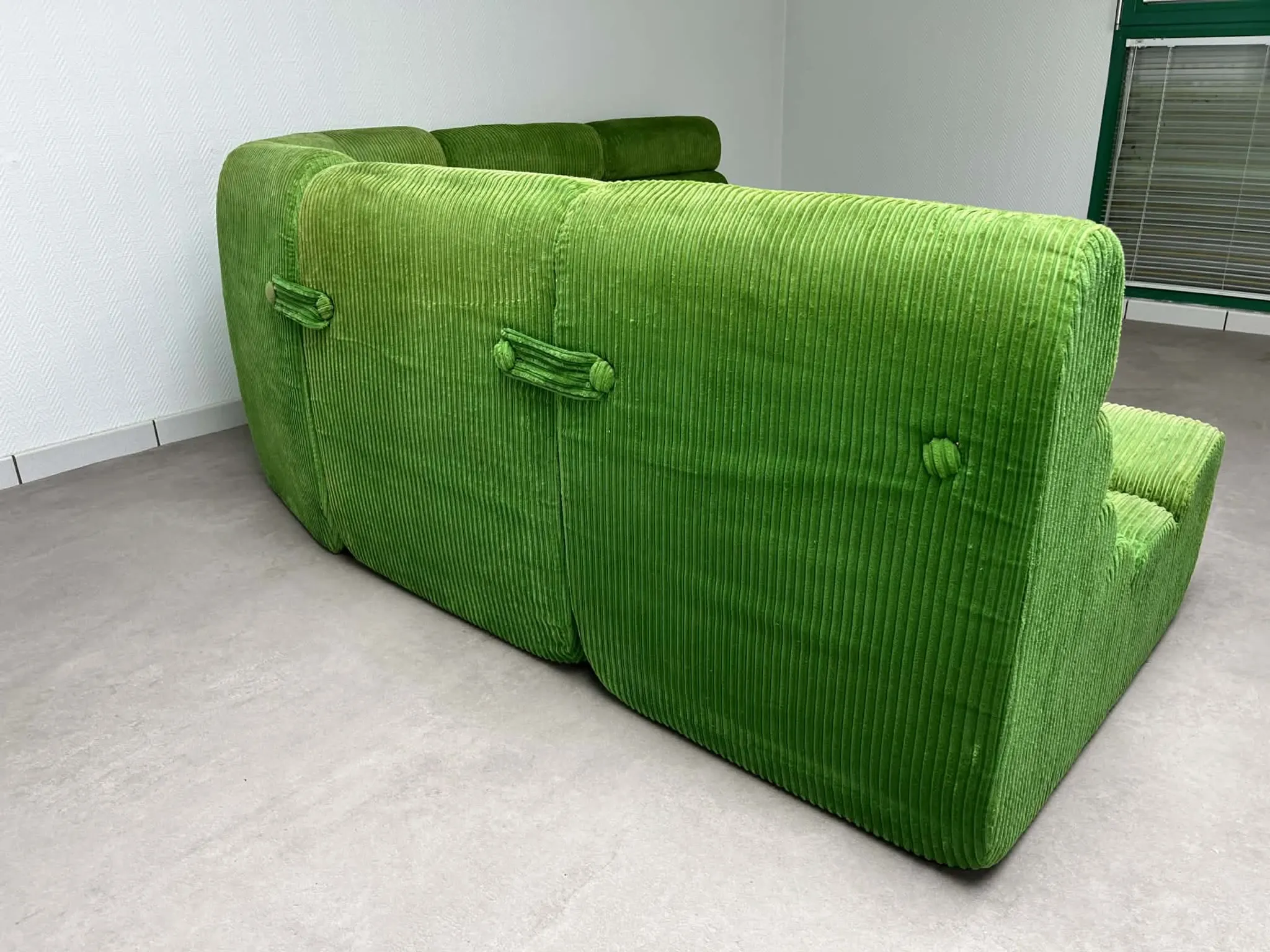 Modular green velvet corner sofa, 1970s